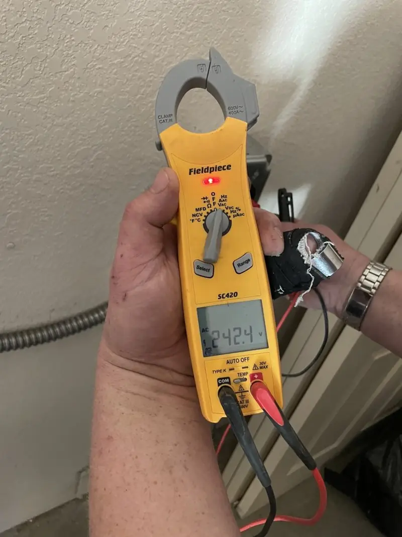 Voltage testing with clamp meter during Ceiling Fan Installation in Hidden Valley